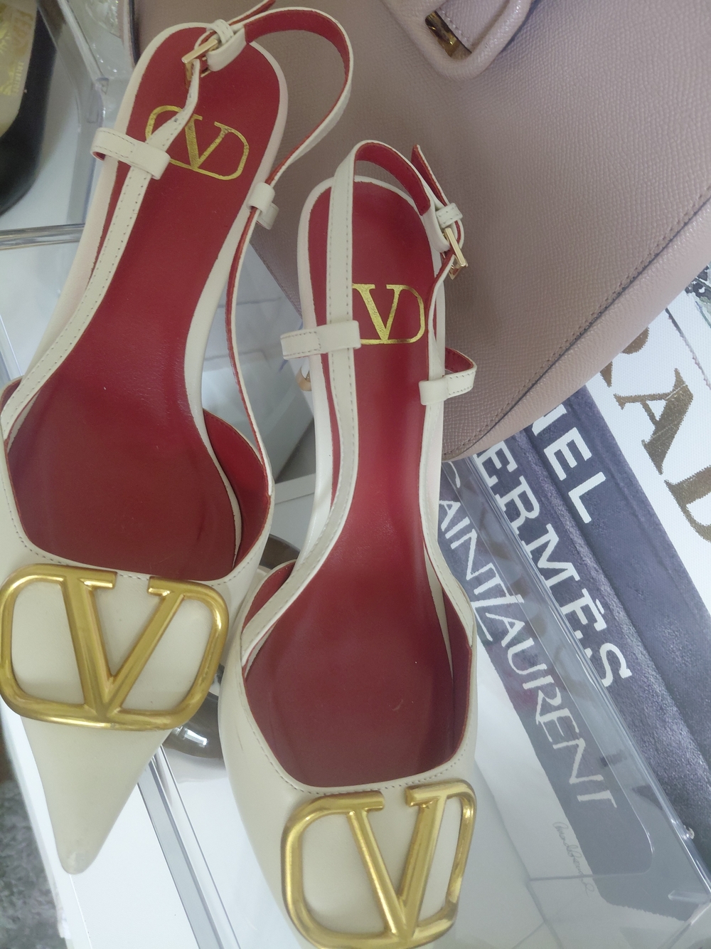 Valentino Garavani White Slingback Pumps with Gold V Logo